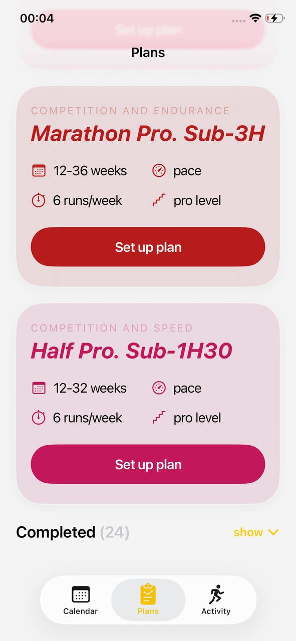 The Pro tier on the Plans screen — Marathon Pro Sub-3H and Half Pro Sub-1H30, both gated to runners already near goal pace.